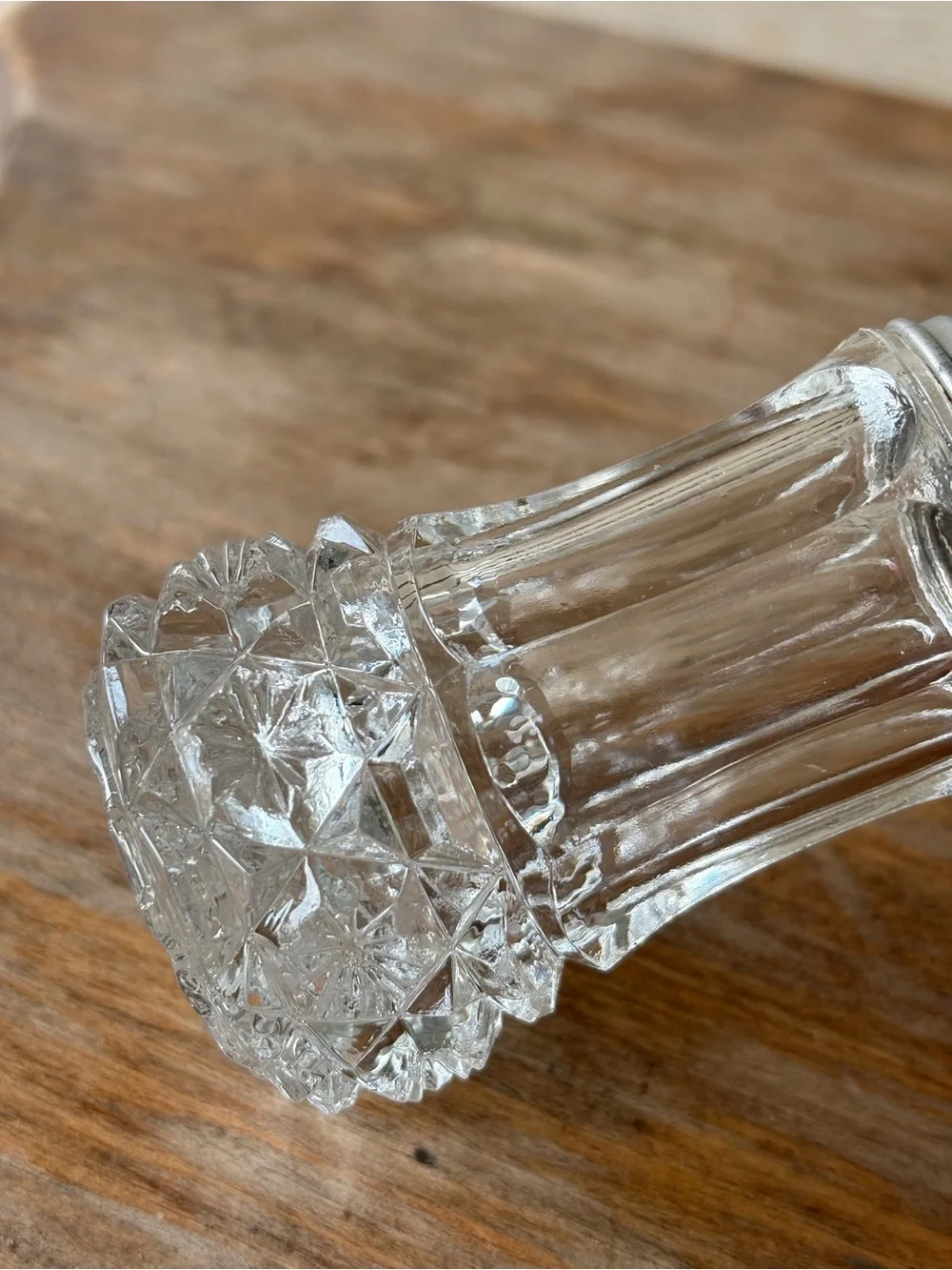 VTG cut crystal sugar shaker featuring a diamond point pattern on the base.